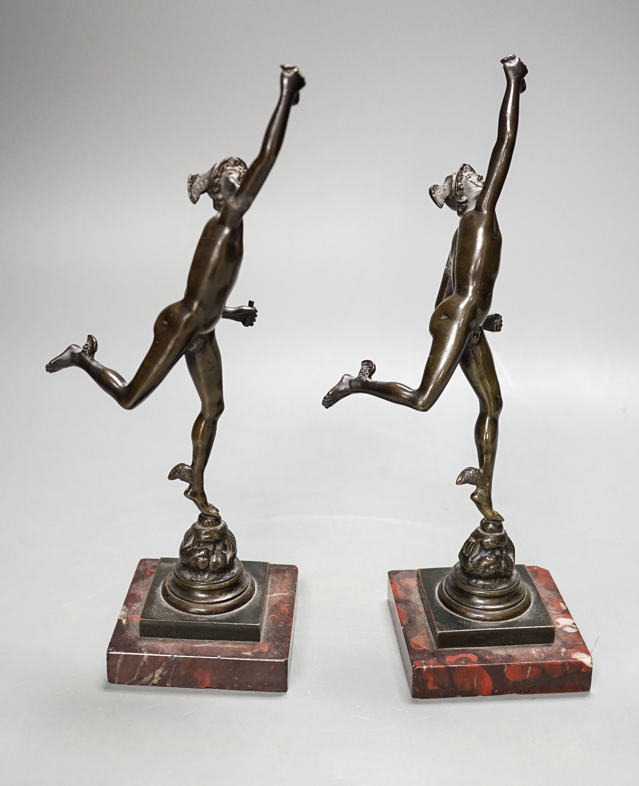 Two 19th century Grand Tour souvenir bronze figures of Mercury, 23 cms high.